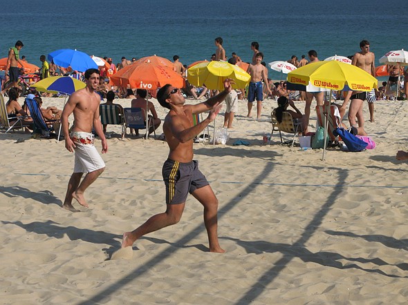 People playing vollyboll on the beach in Rio de Janeiro Brazil