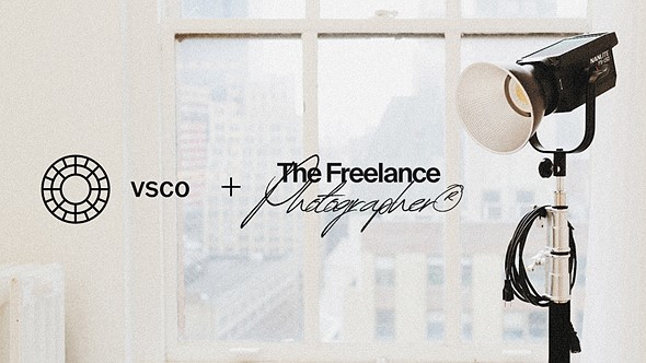 black text is placed against an image of a white wall with a window and a light on a stand