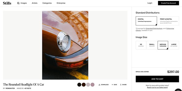a screenshot of a stock photo website with a photo of a red car