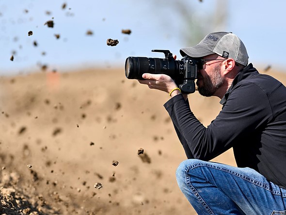 person shooting flying mud with Nikon z6iii