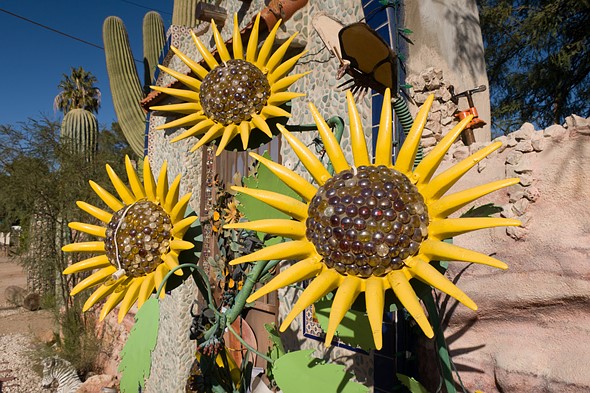 metal sunflower sculptures in the arizona desert