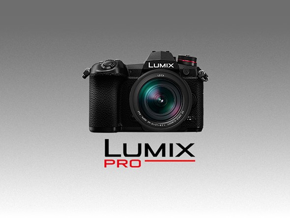 a lumix camera with black and red text under it is on a black to white gradient