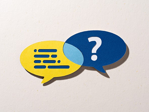 a yellow word bubble with blue lines overlaps a blue one with a white question mark