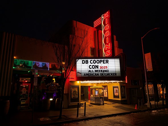 the kiggins theater in vancouver washington at night with a marquee reading db cooper con 2025