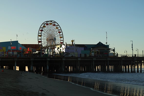 beach pier at sunrise open gate