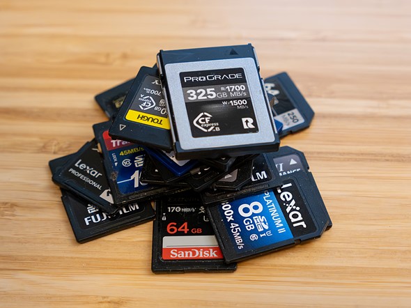 pile of memory cards with CFexpress on top