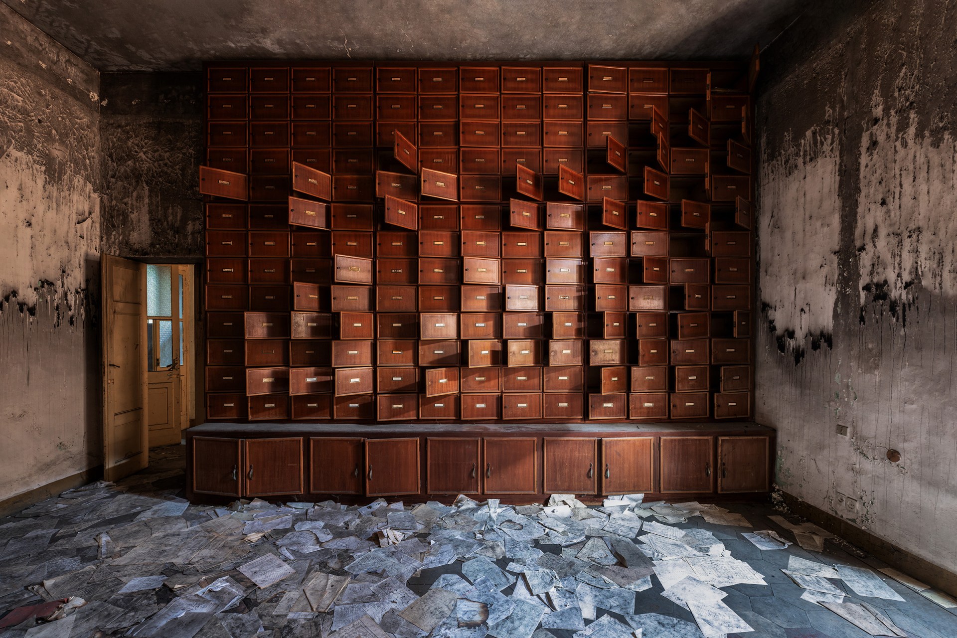 Wooden filing drawers in a former psychiatric hospital in Italy.